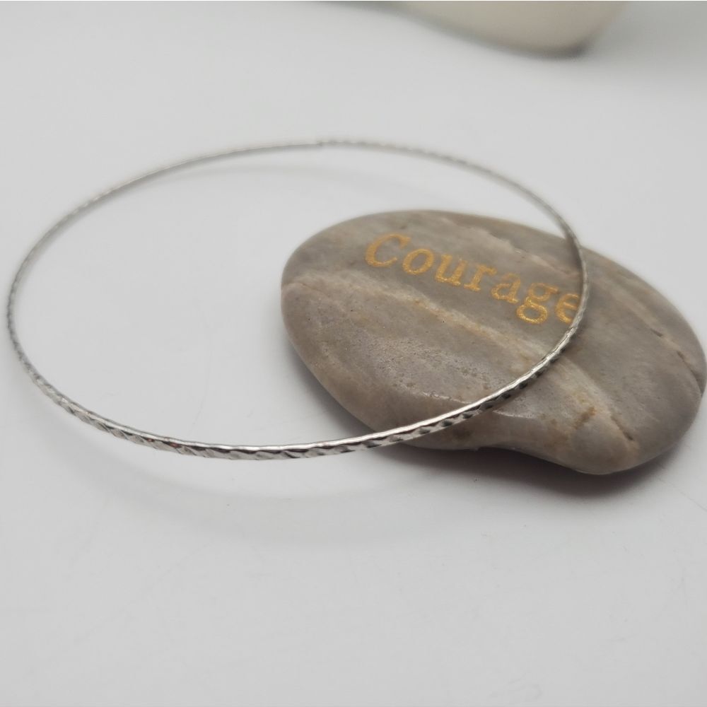 Silver toned‎ tracks bracelet